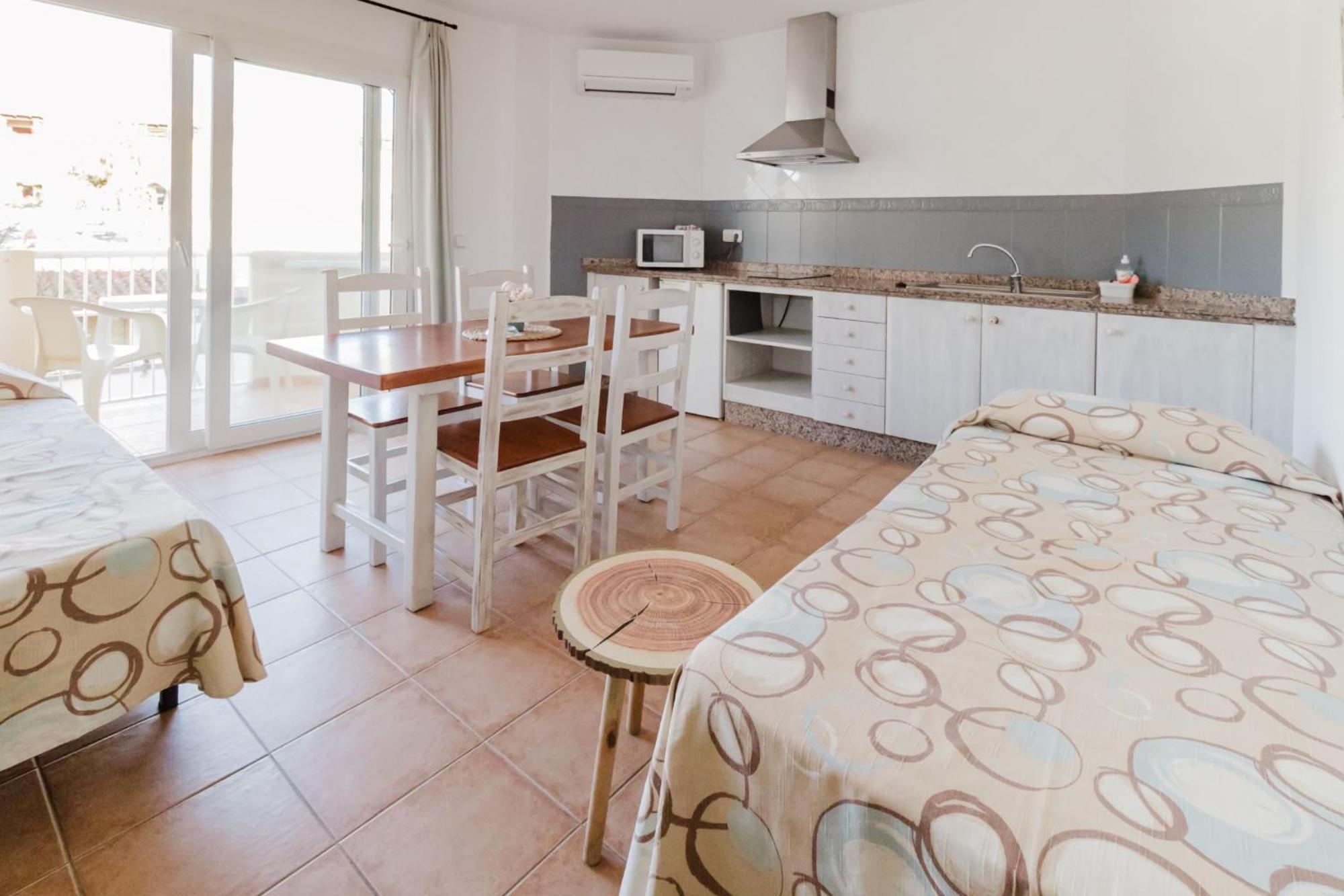Apartamentos Timon - Emar Hotels เอสปุญอลส์ ภายนอก รูปภาพ