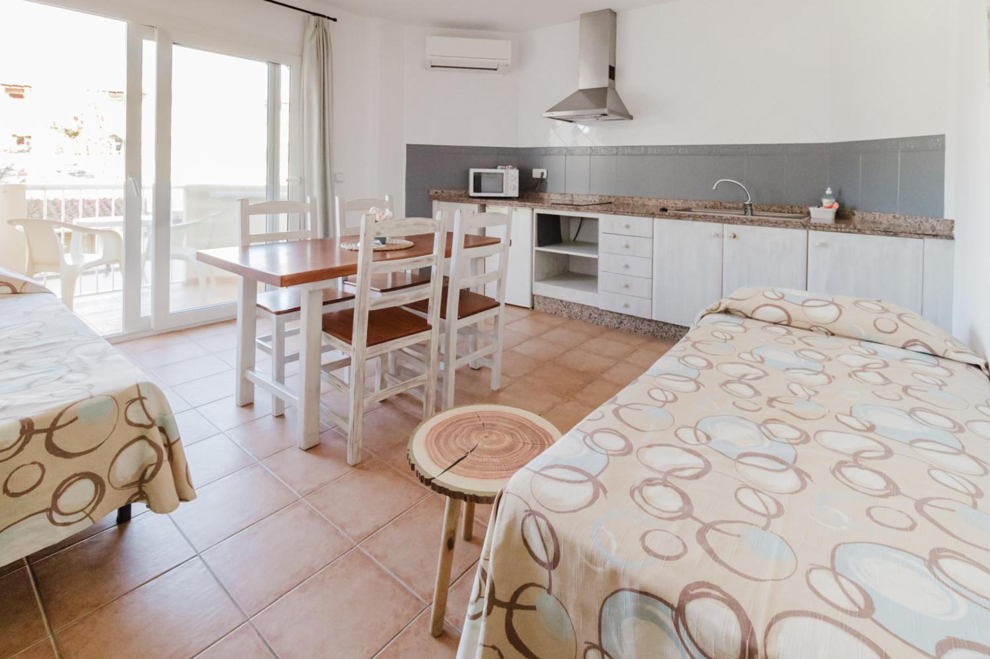 Apartamentos Timon - Emar Hotels เอสปุญอลส์ ภายนอก รูปภาพ